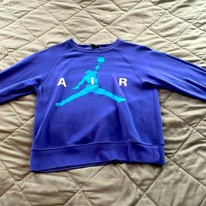 A purple air Jordan sweatshirt